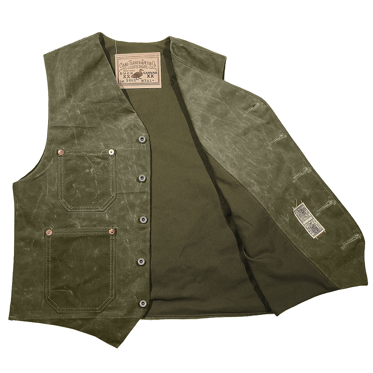 A green waxed canvas waistcoat with multiple pockets and a button-up